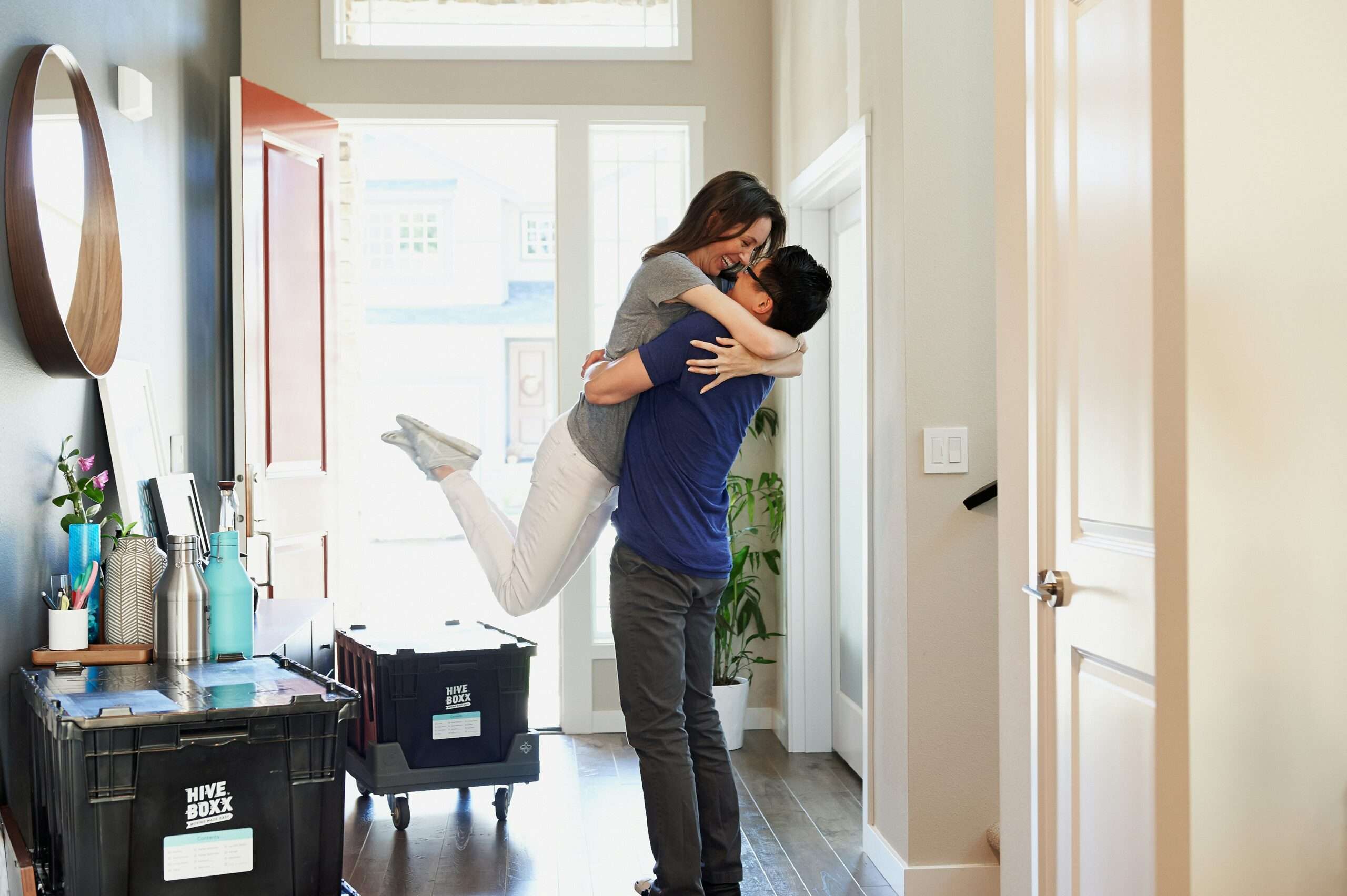 Happy couple celebrating their move into a new Fargo-Moorhead home